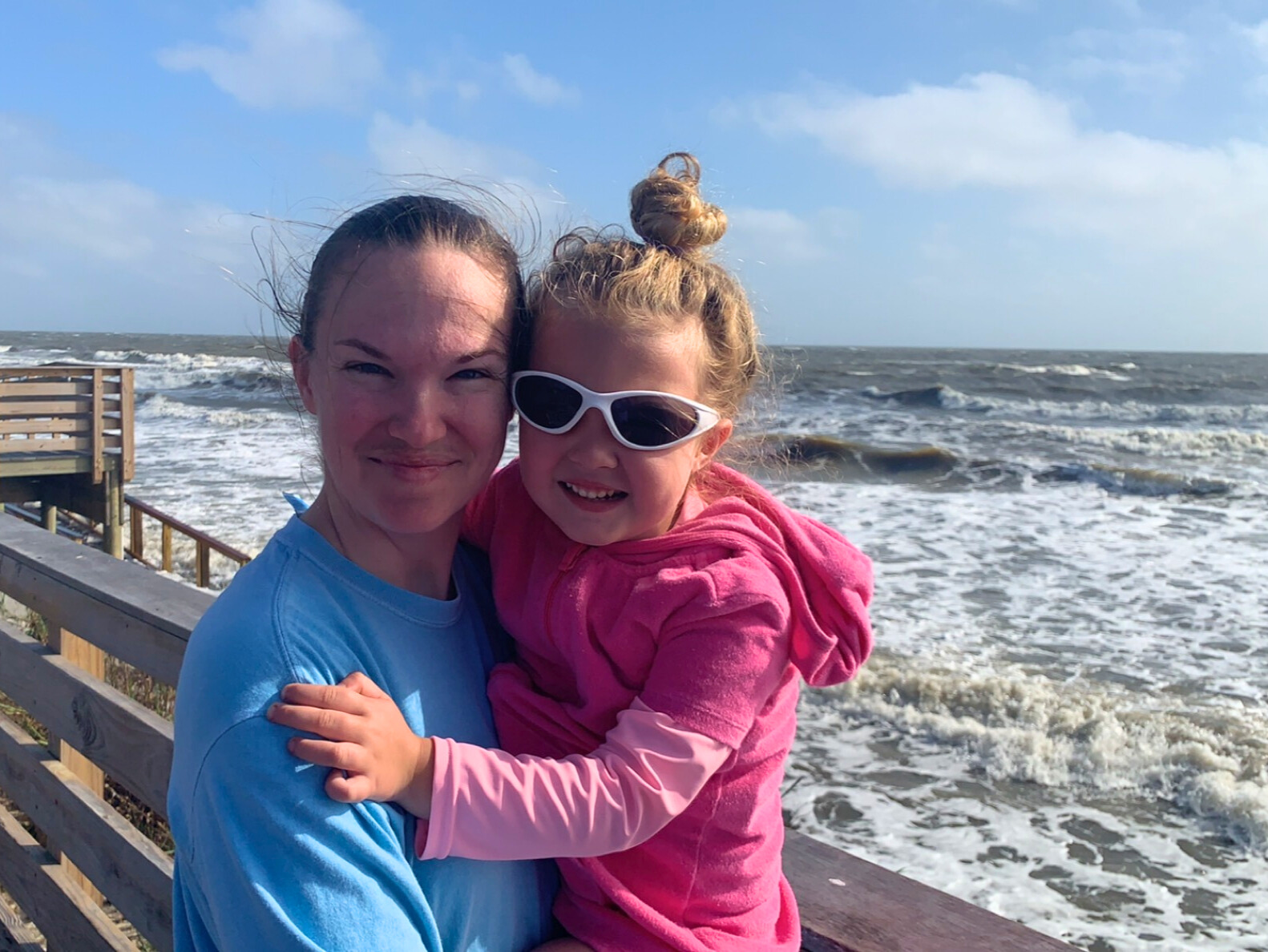 Hope and daughter at the beach.